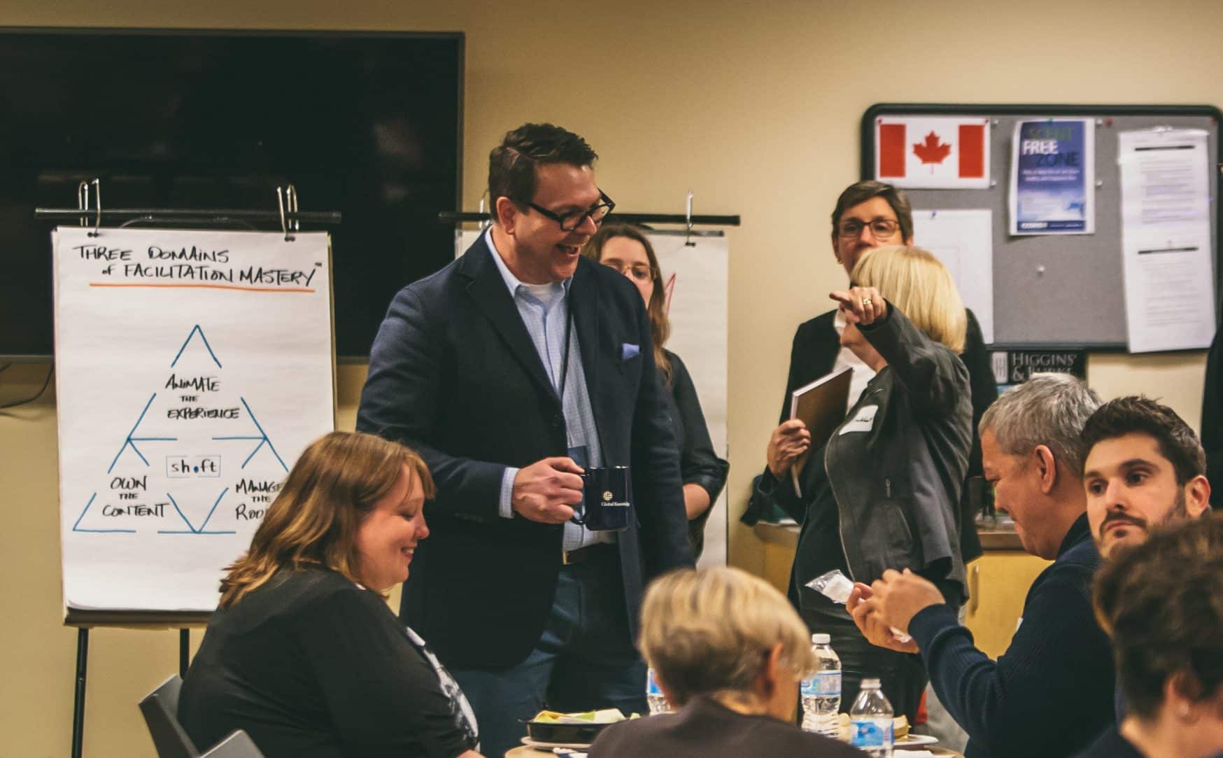 moe poirier in a crowd during facilitation session